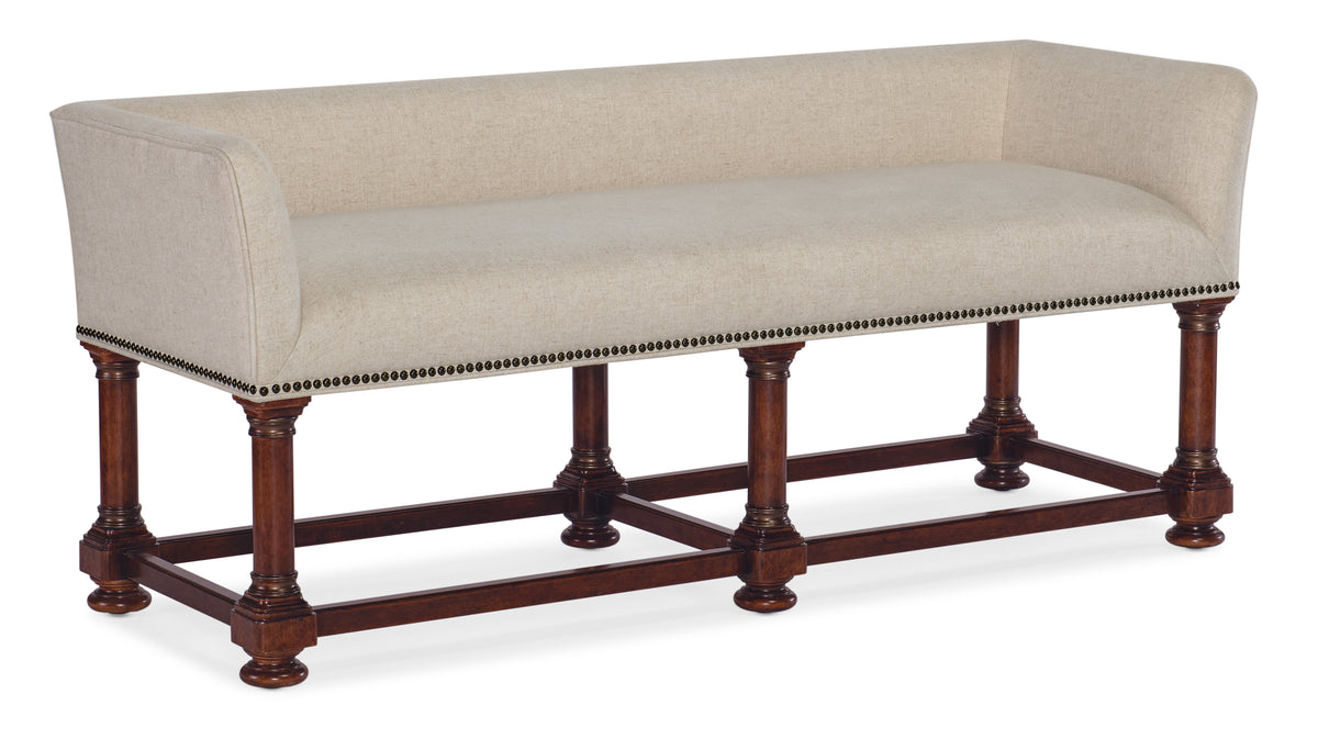 a white couch with brown legs