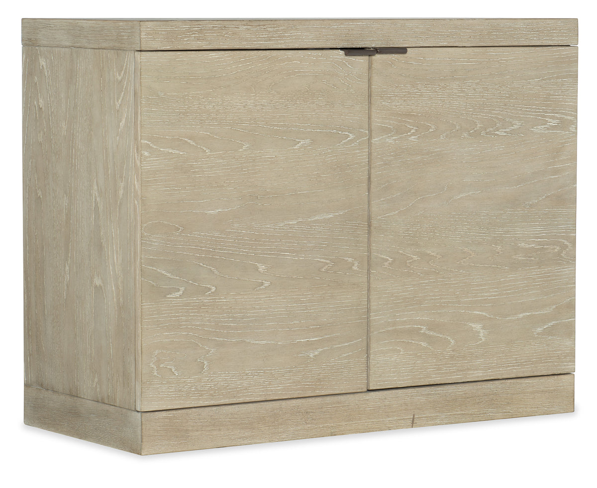 a wooden cabinet with a handle