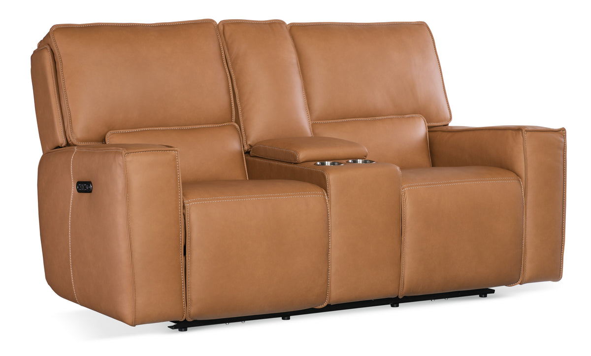 a brown couch with armrests