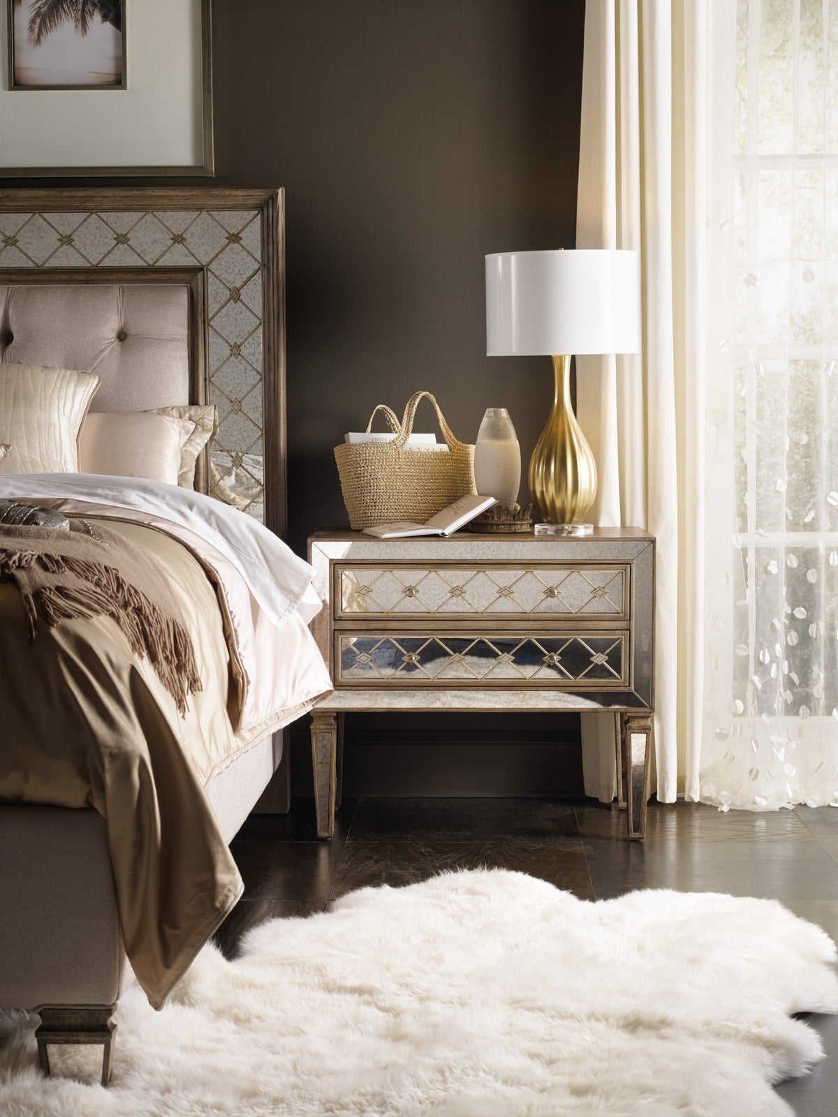 a bedroom with a bed and a lamp