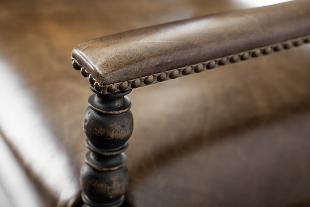a close up of a chair arm