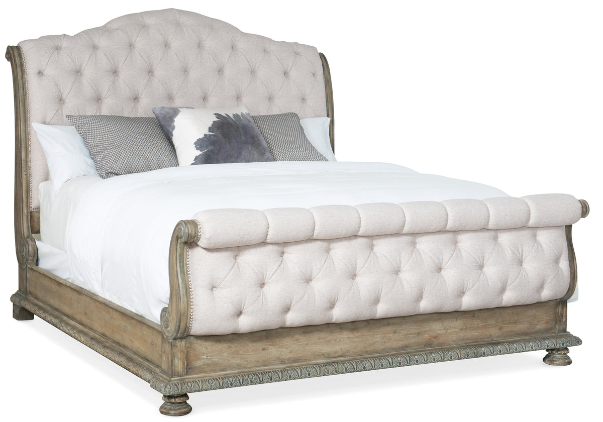 a bed with pillows on it