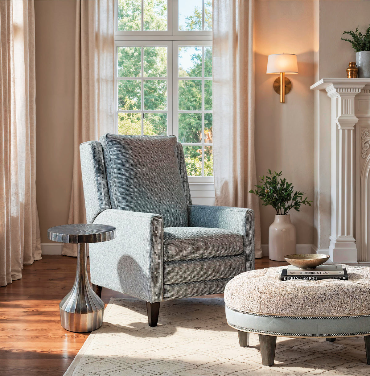 a living room with a chair and a table