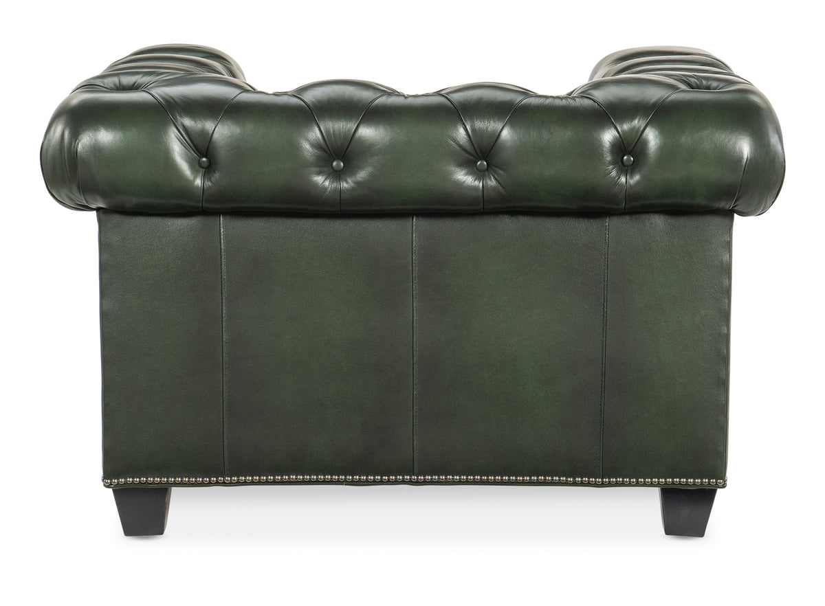 the back of a green leather chair