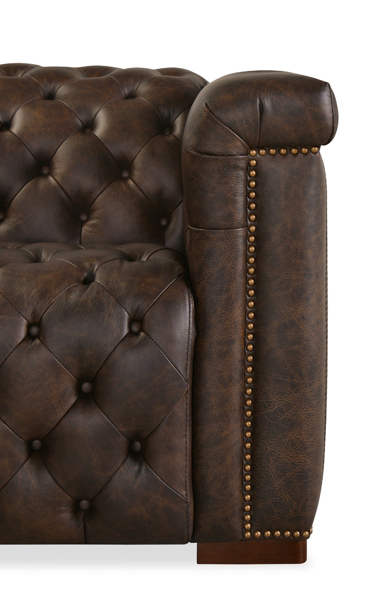 a close up of a brown leather couch