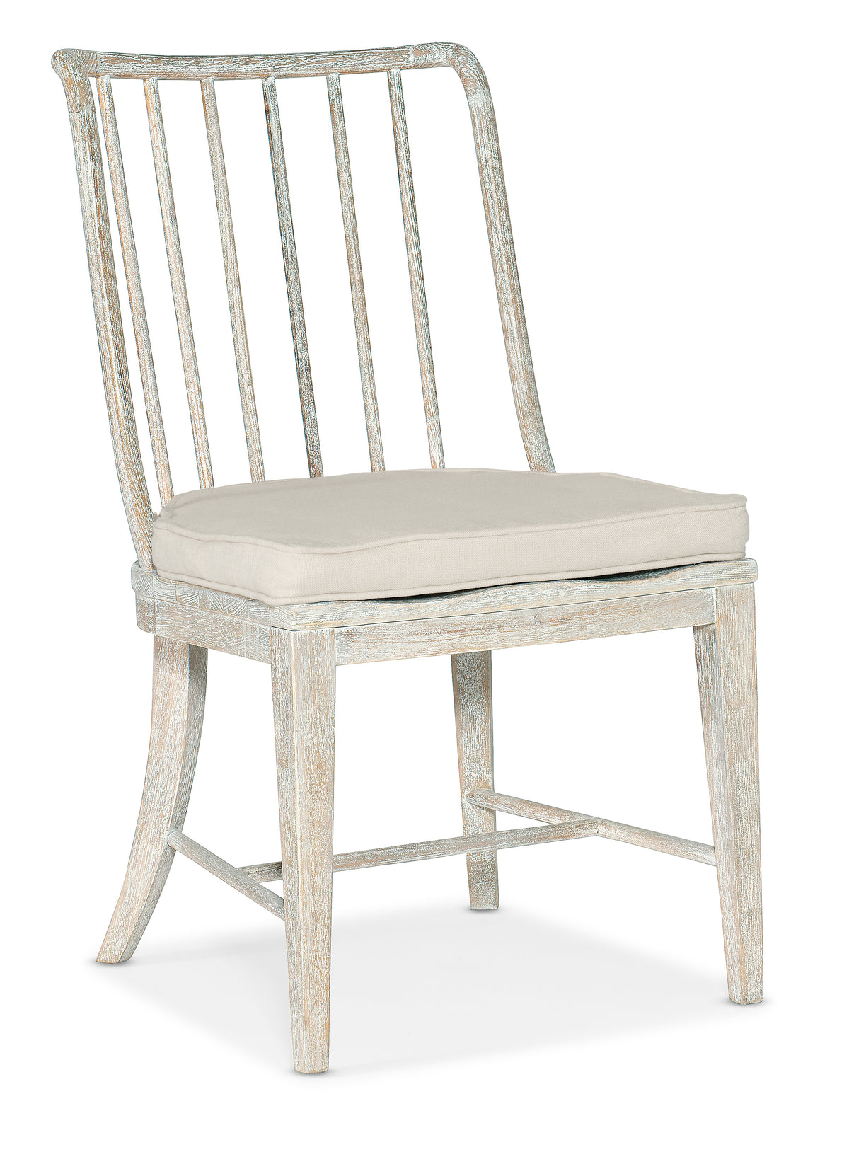 a white chair with a cushion