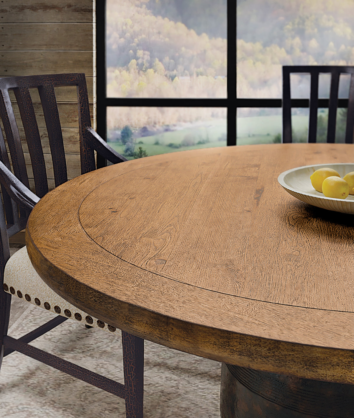 a table with a bowl of fruit on it
