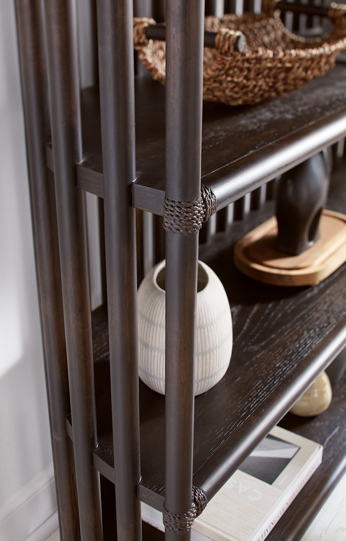 a shelf with a vase and a vase on it
