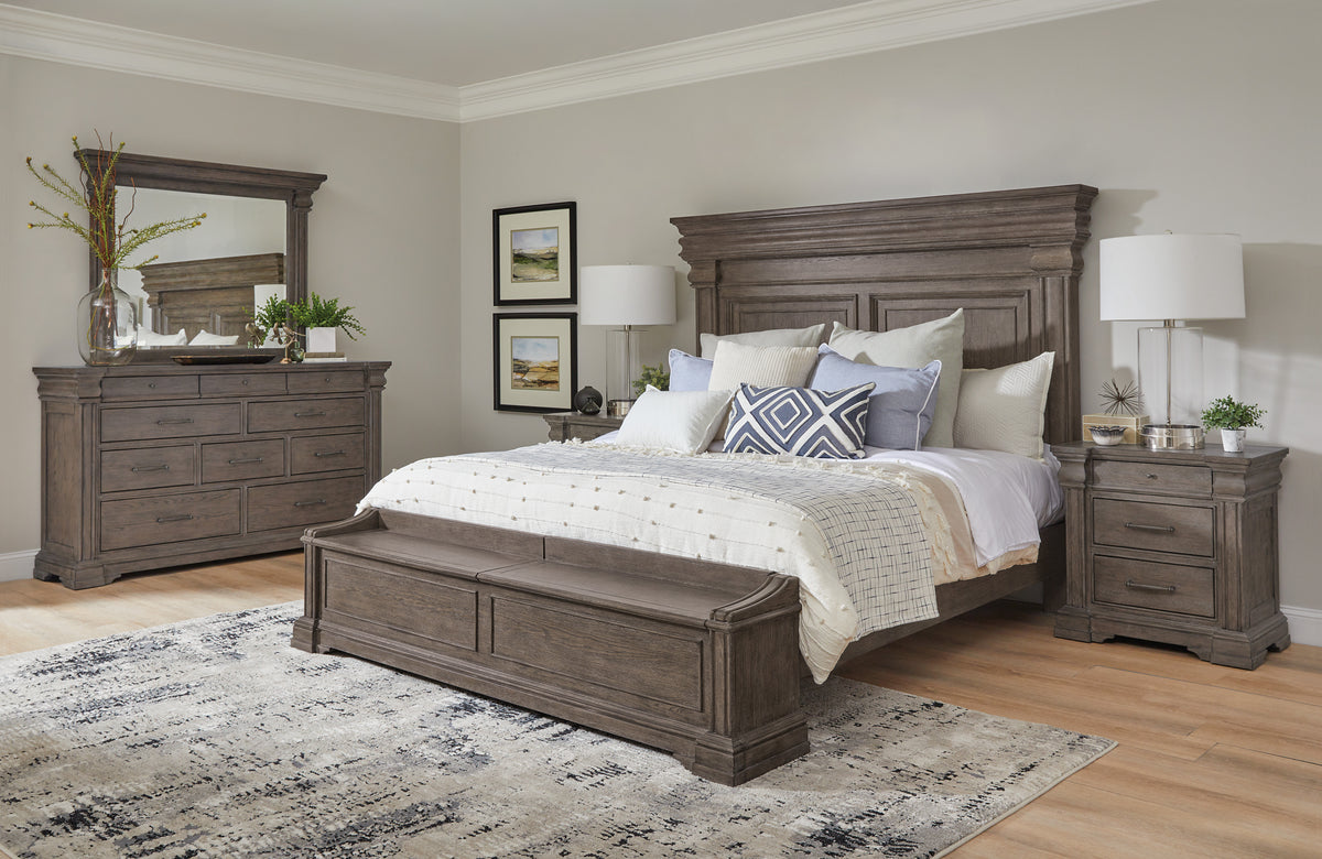 a bedroom with a bed and dresser