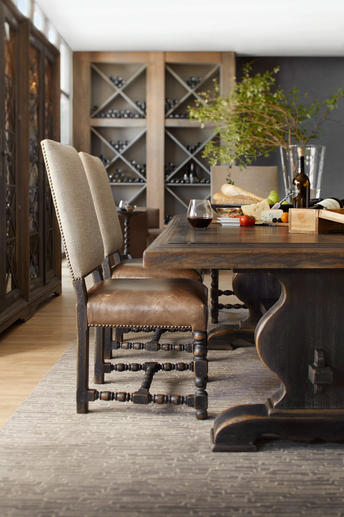 a table with food and wine bottles on it