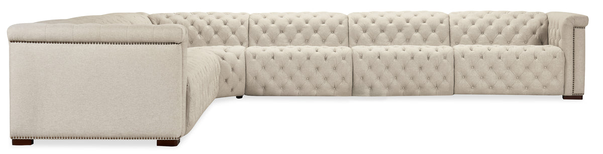 a white couch with buttons
