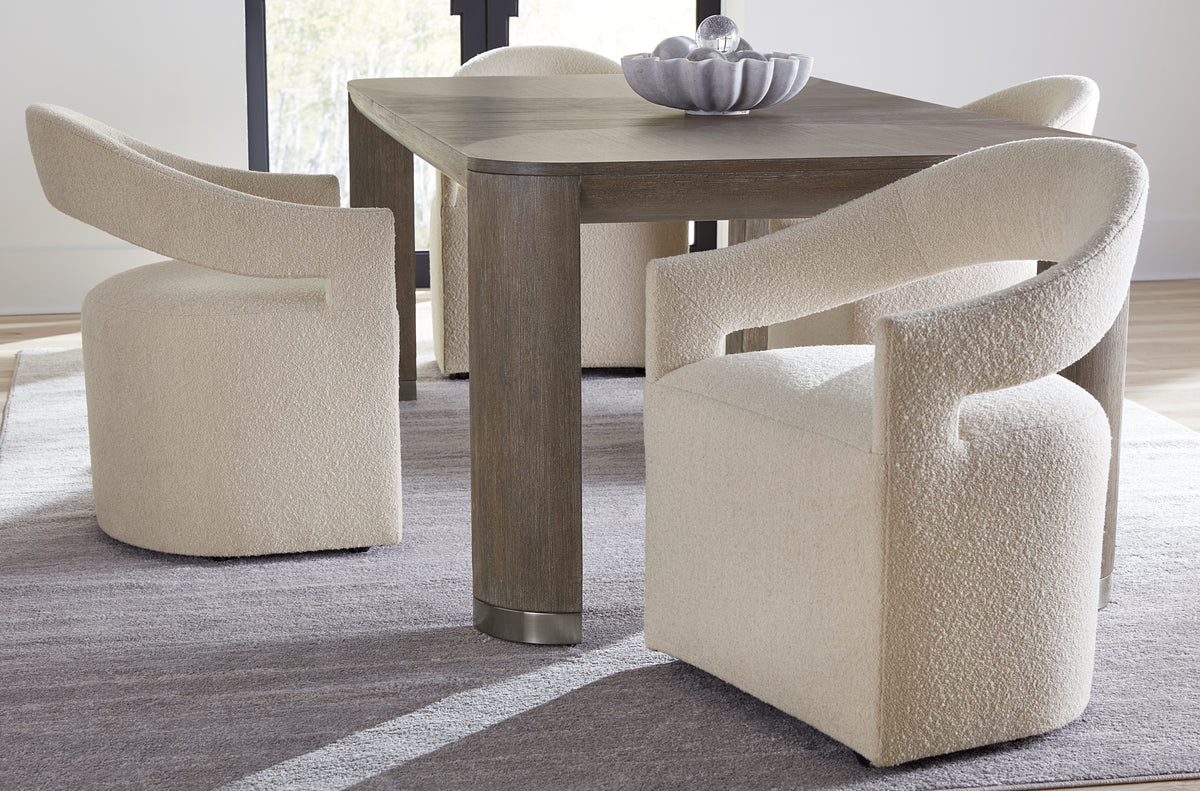 a table with chairs in a room