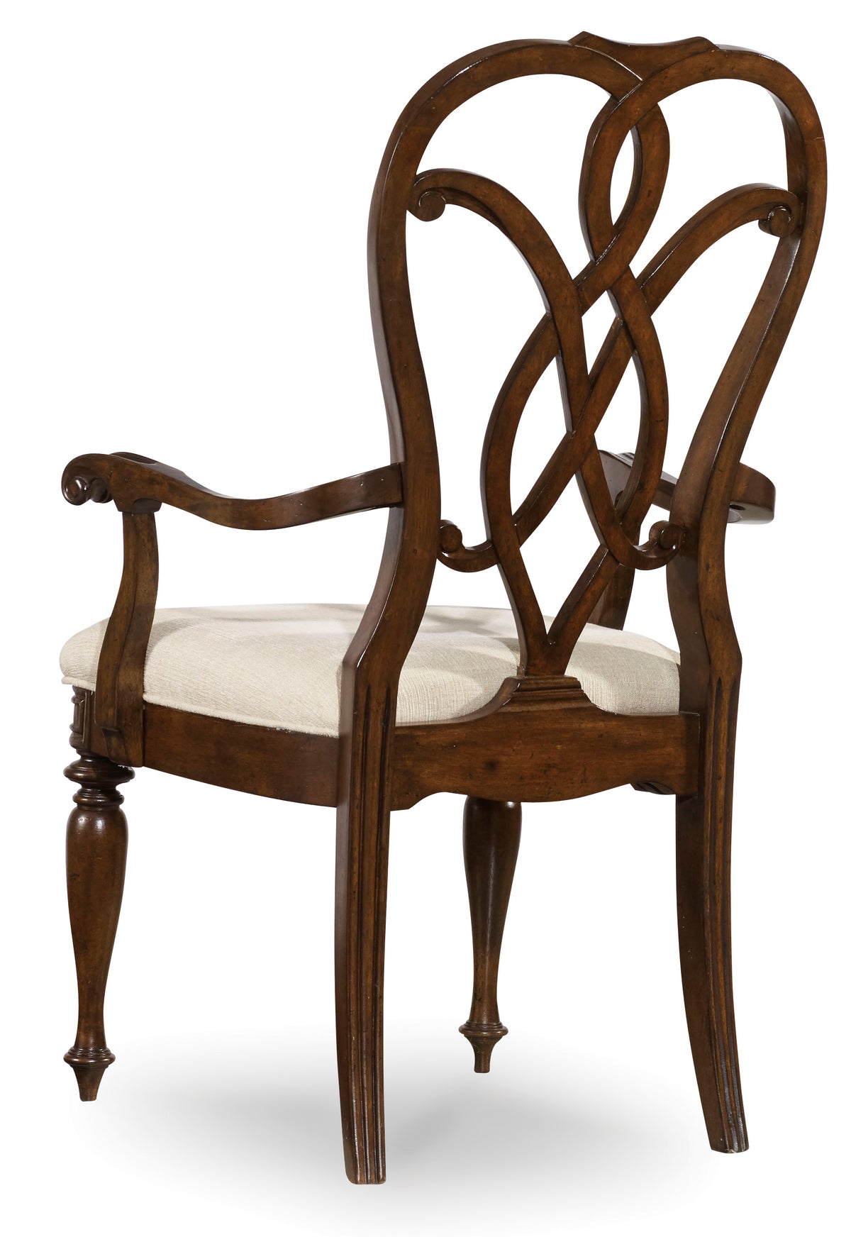 a wooden chair with a white cushion