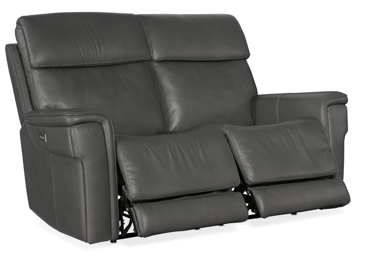 a grey reclining chair with two recliners