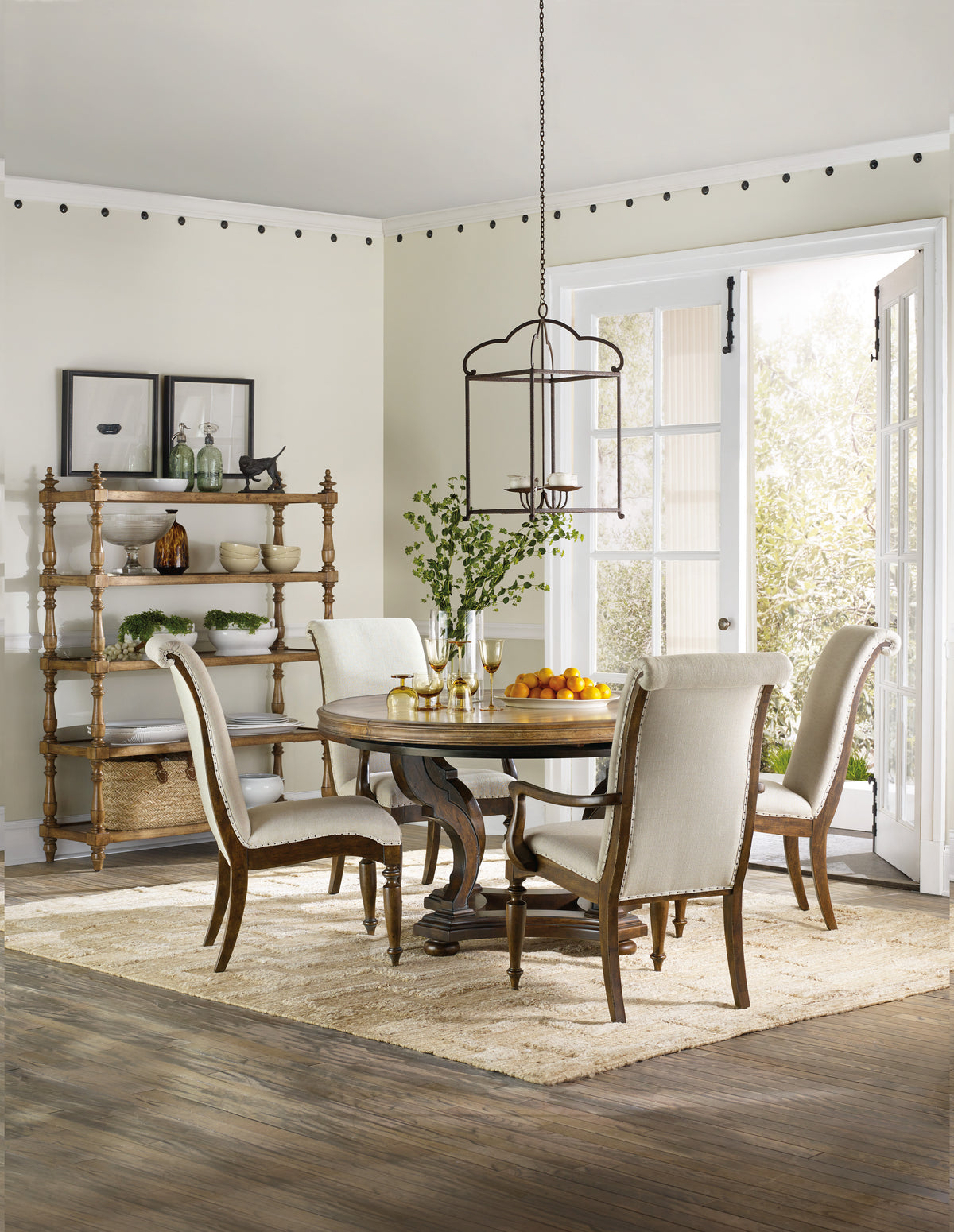 a dining room with a table and chairs