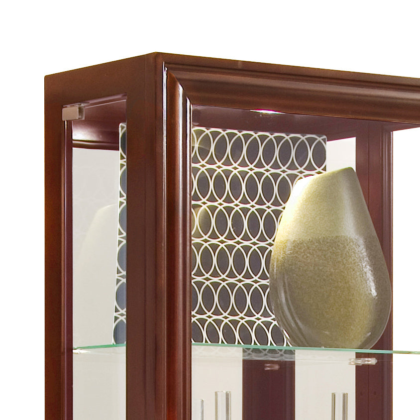 a glass cabinet with a vase on top