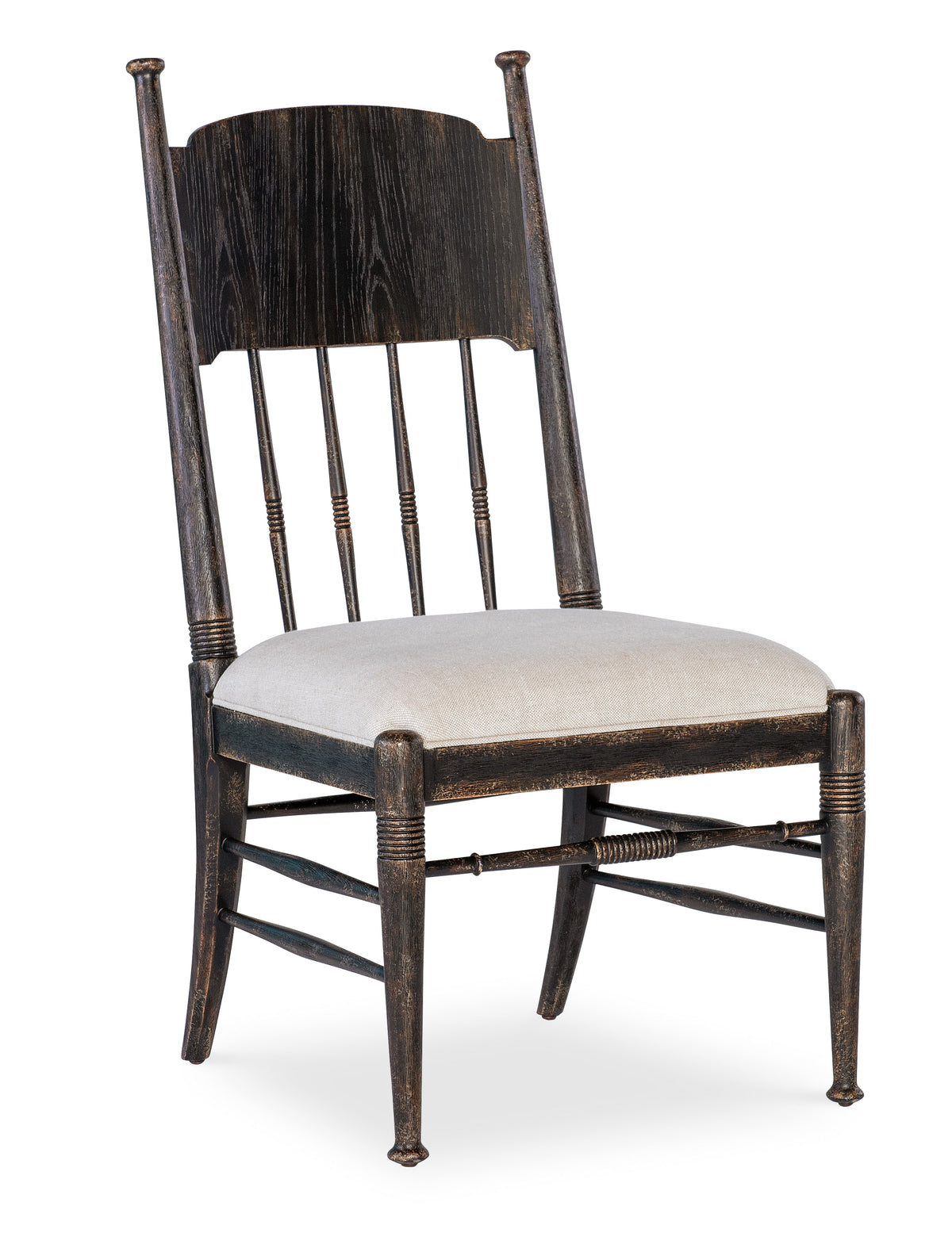 a wooden chair with a white cushion