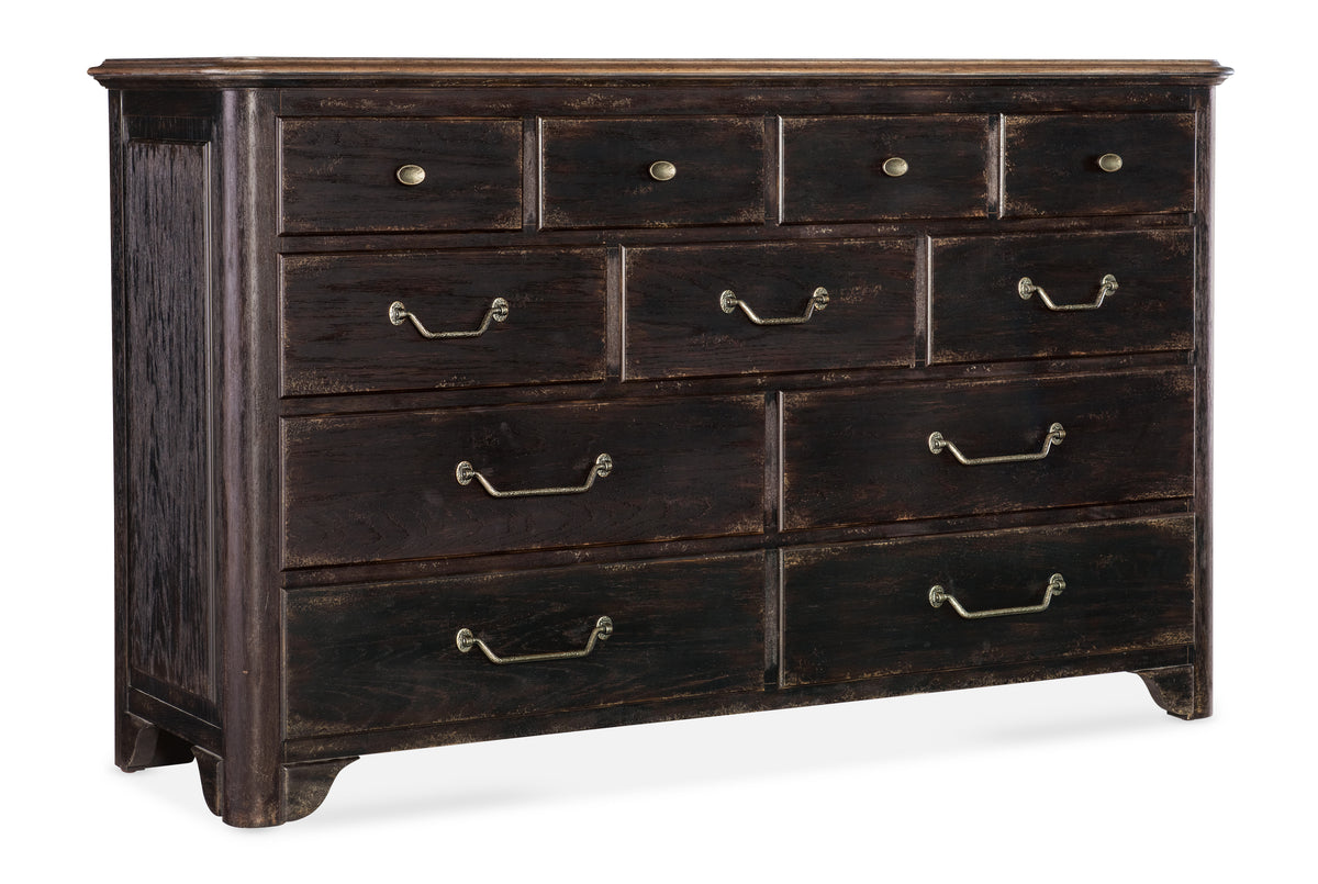a black dresser with many drawers