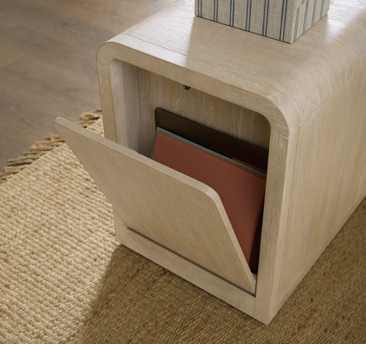 a wooden box with a book inside