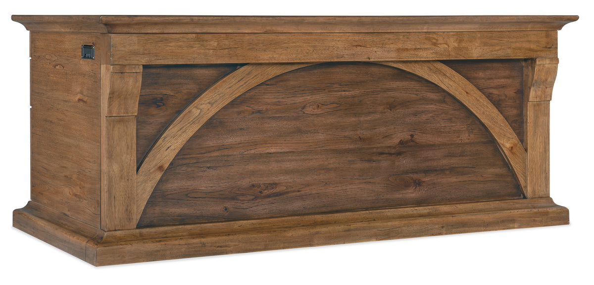 a wooden sign with a curved design