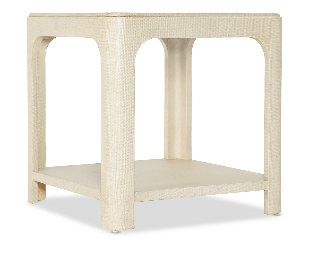 a white table with a shelf