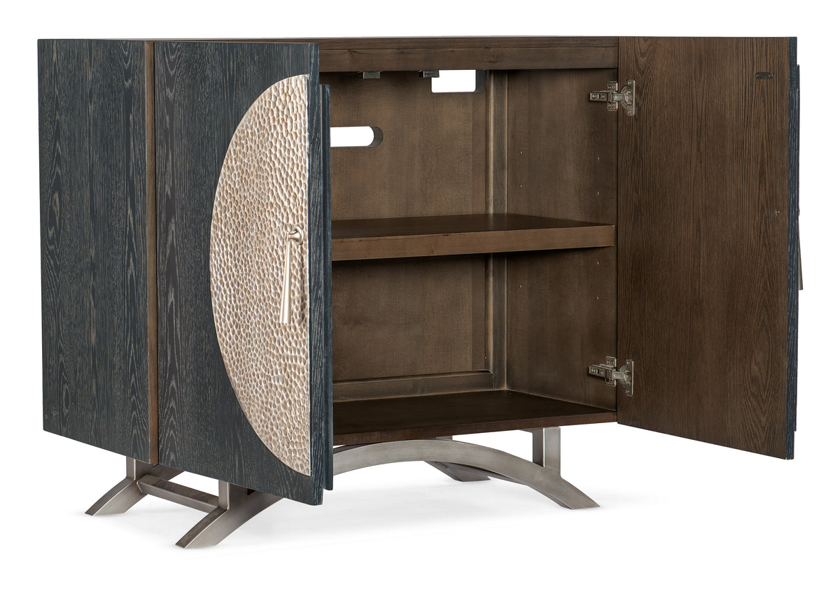 a brown and black cabinet with a round design
