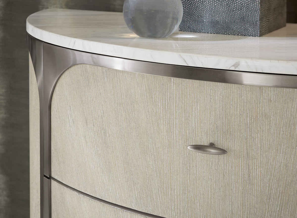 a glass ball on a marble top