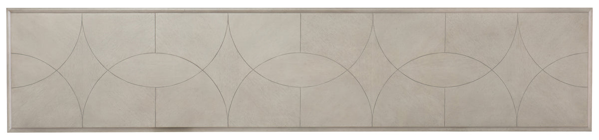 a white rectangular table with a circular design