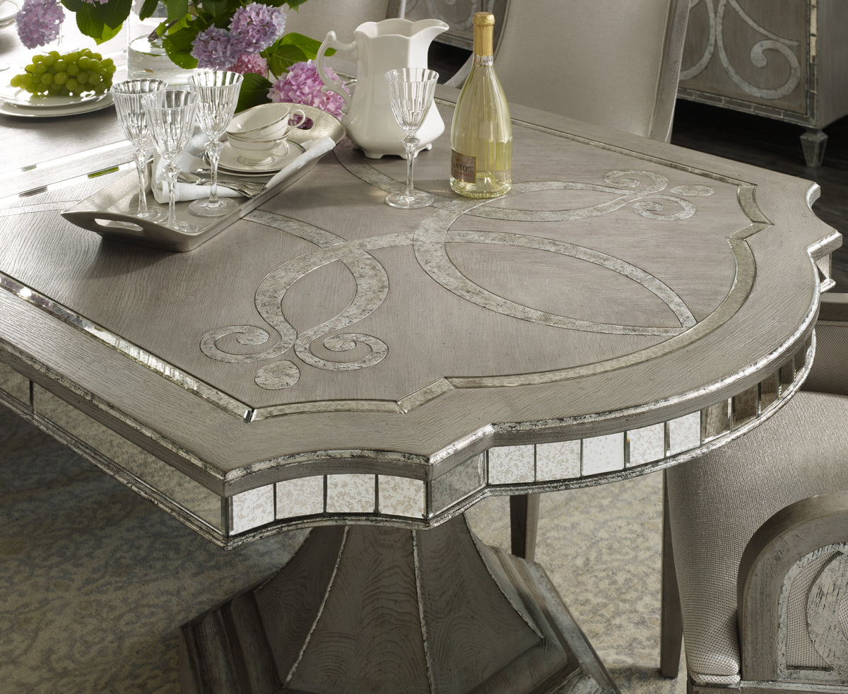 a table with a tray of wine and glasses on it