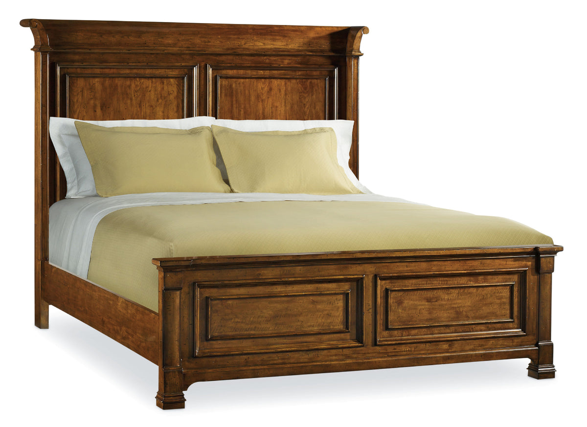 a bed with a wooden headboard