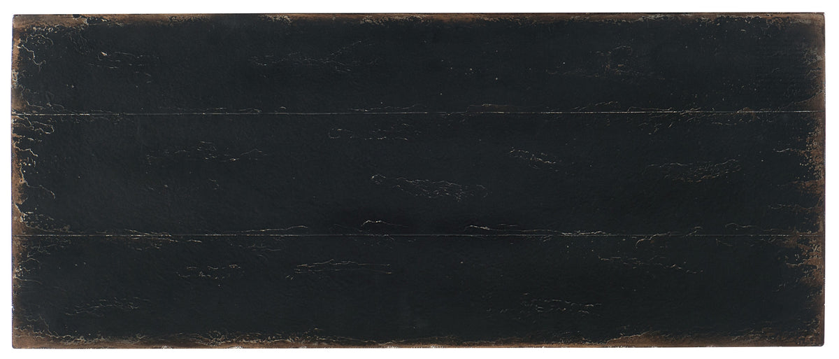 a black rectangular object with brown edges