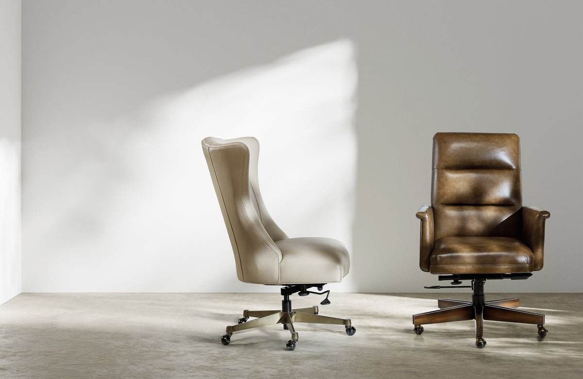 a pair of office chairs in a room