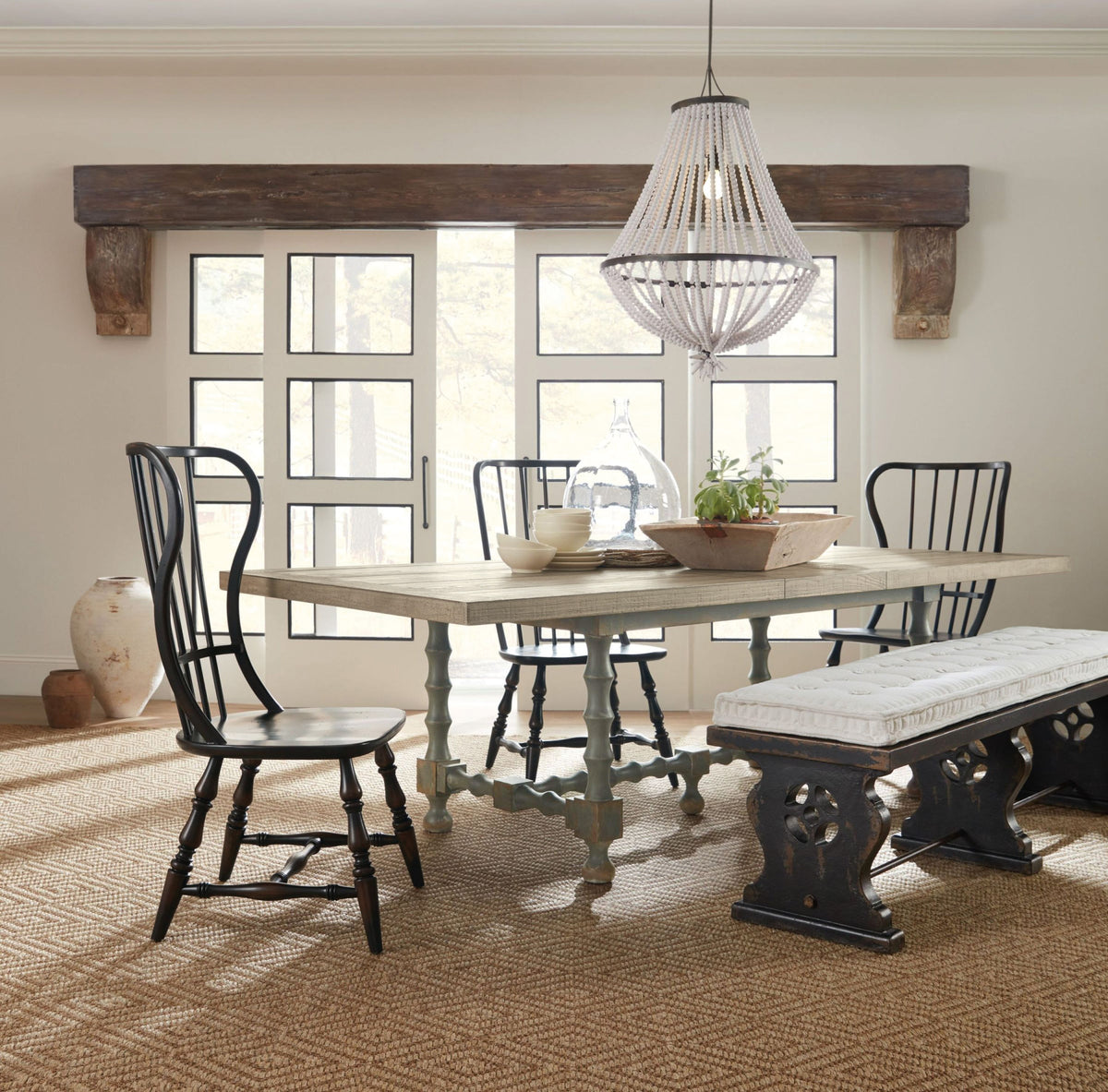 a dining table and chairs in a room