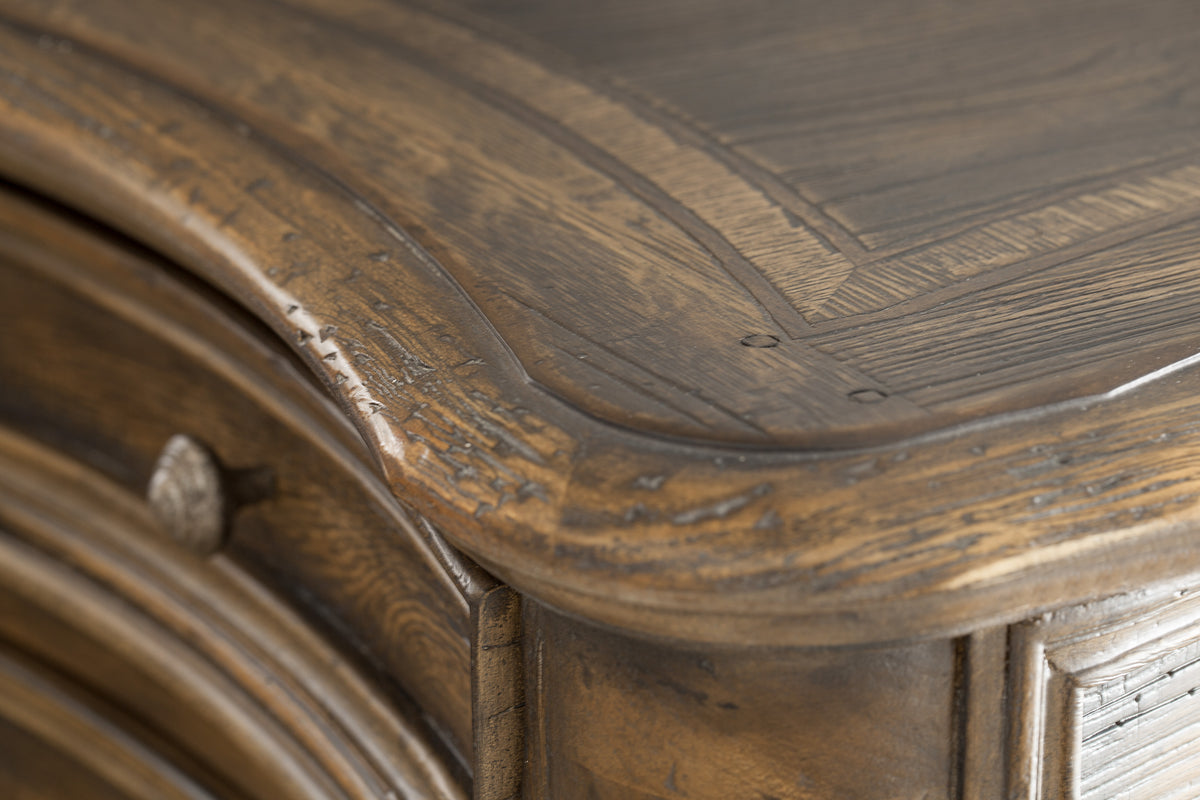 a close up of a wooden dresser
