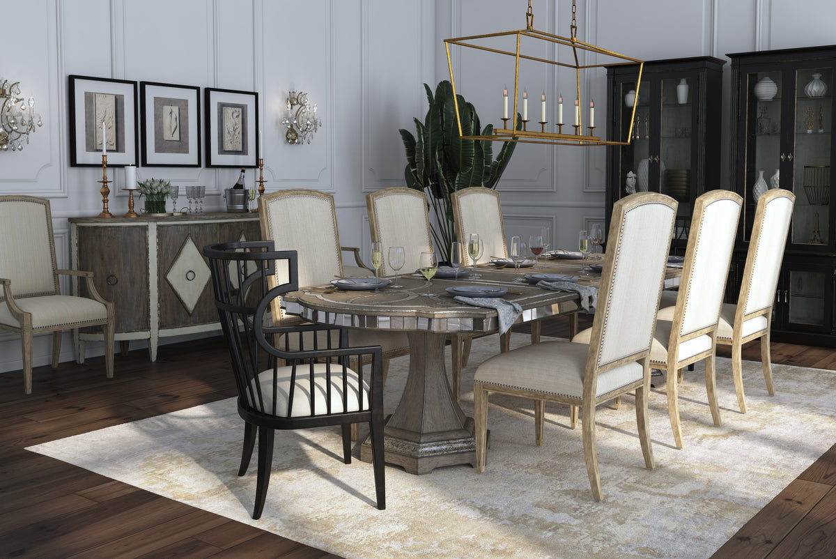 a dining room with a table and chairs
