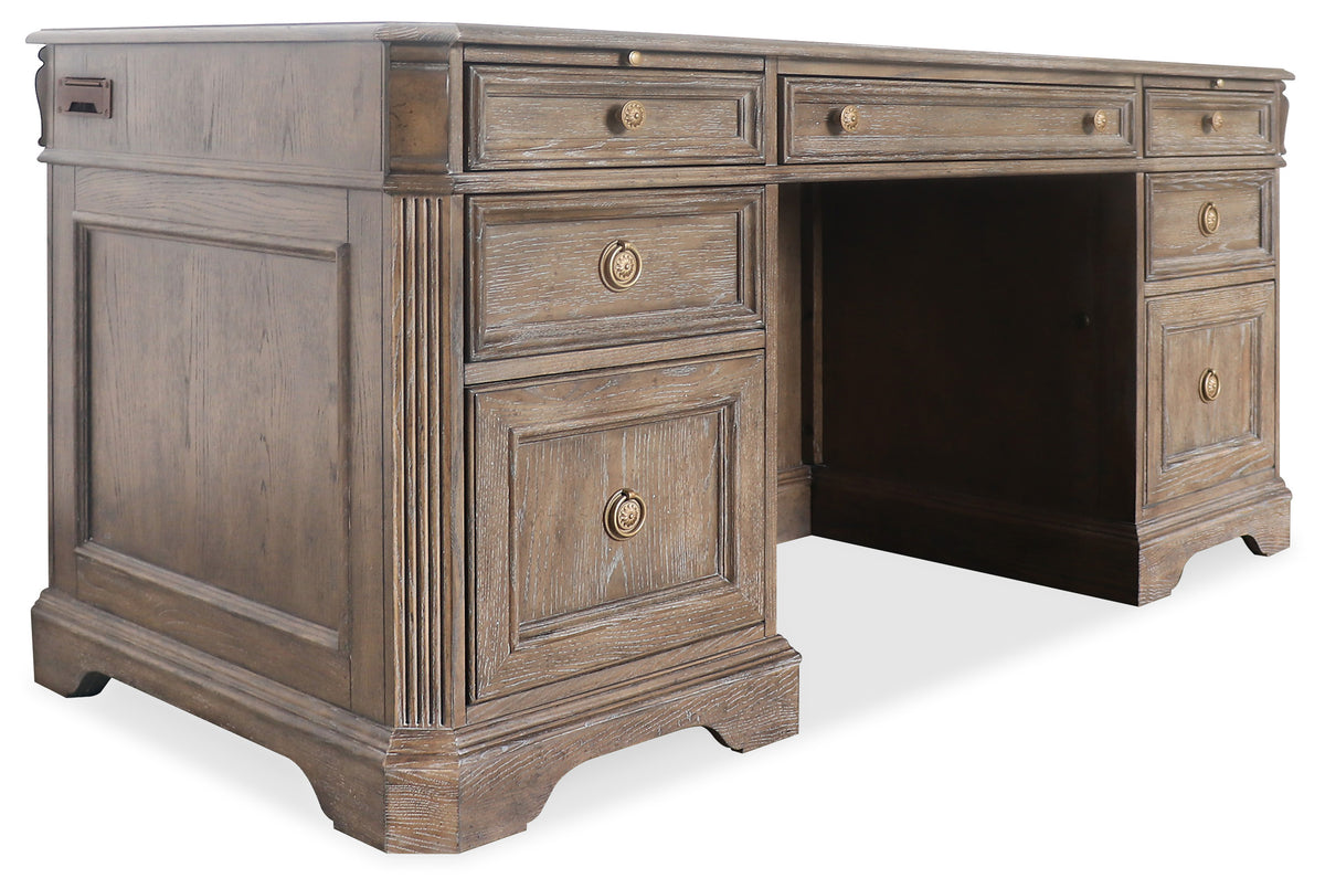 a wooden desk with drawers