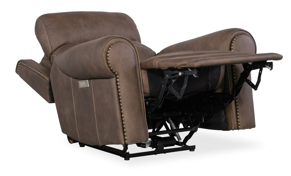 a brown recliner with a white background