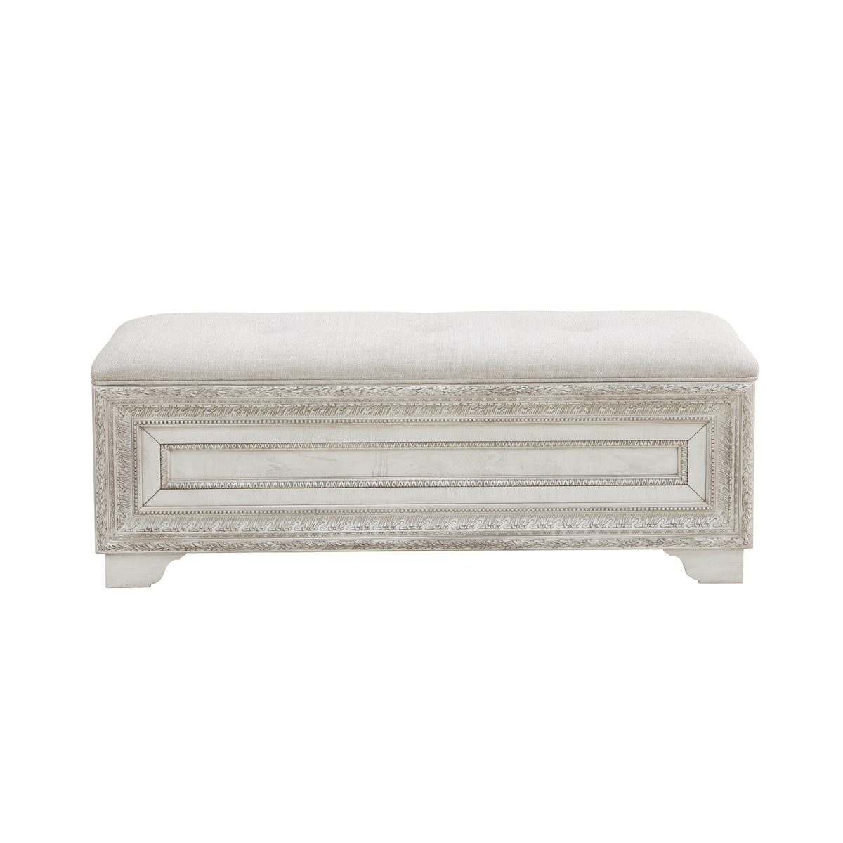 a white bench with a cushion