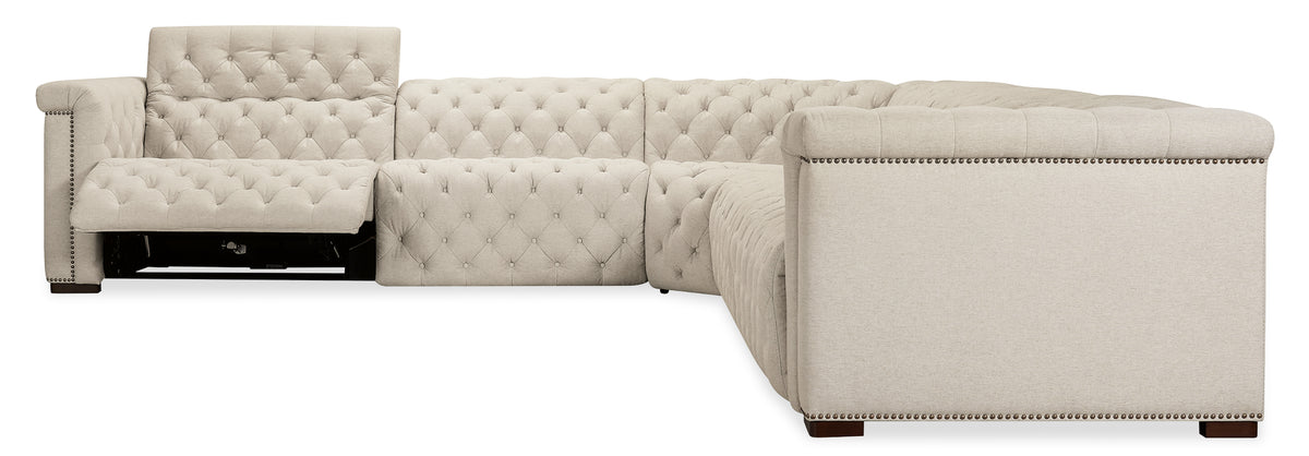 a white couch with brown legs