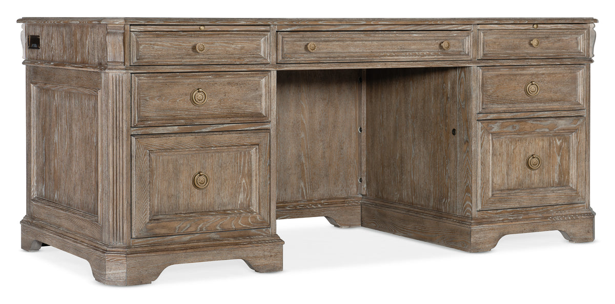 a wooden desk with drawers