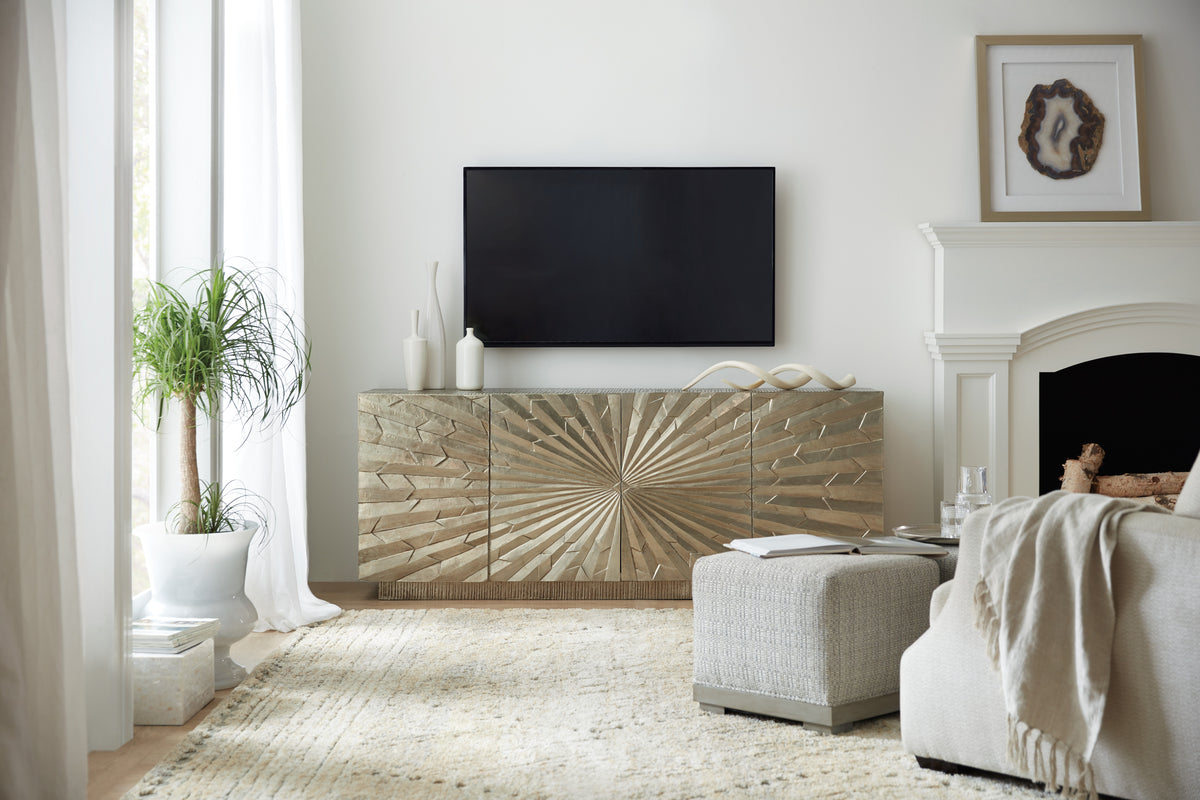 a living room with a tv on the wall