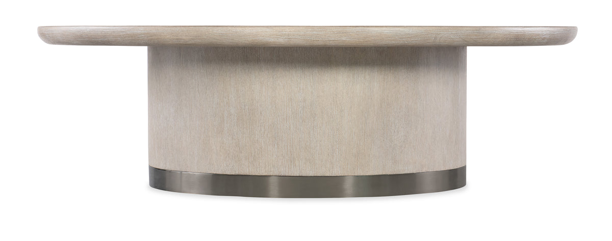 a round wooden table with a metal base