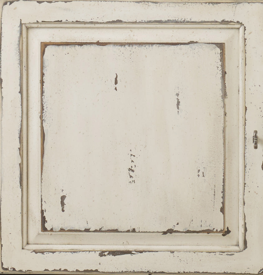 a white cabinet door with a key