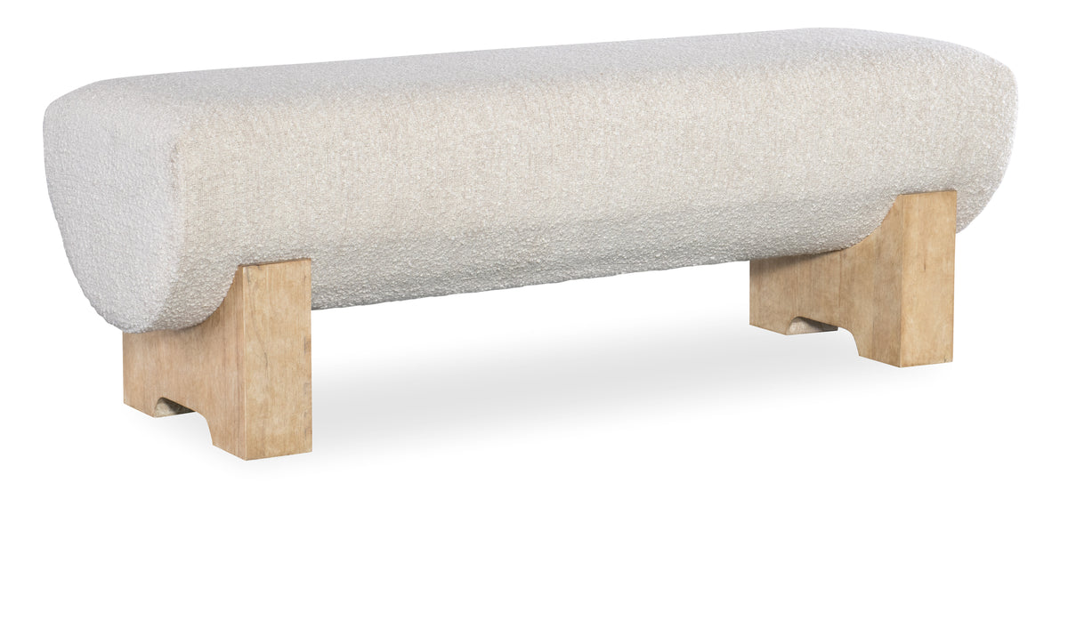 a stone bench with wooden legs