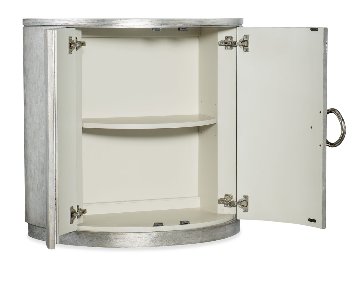 a white cabinet with a silver surface