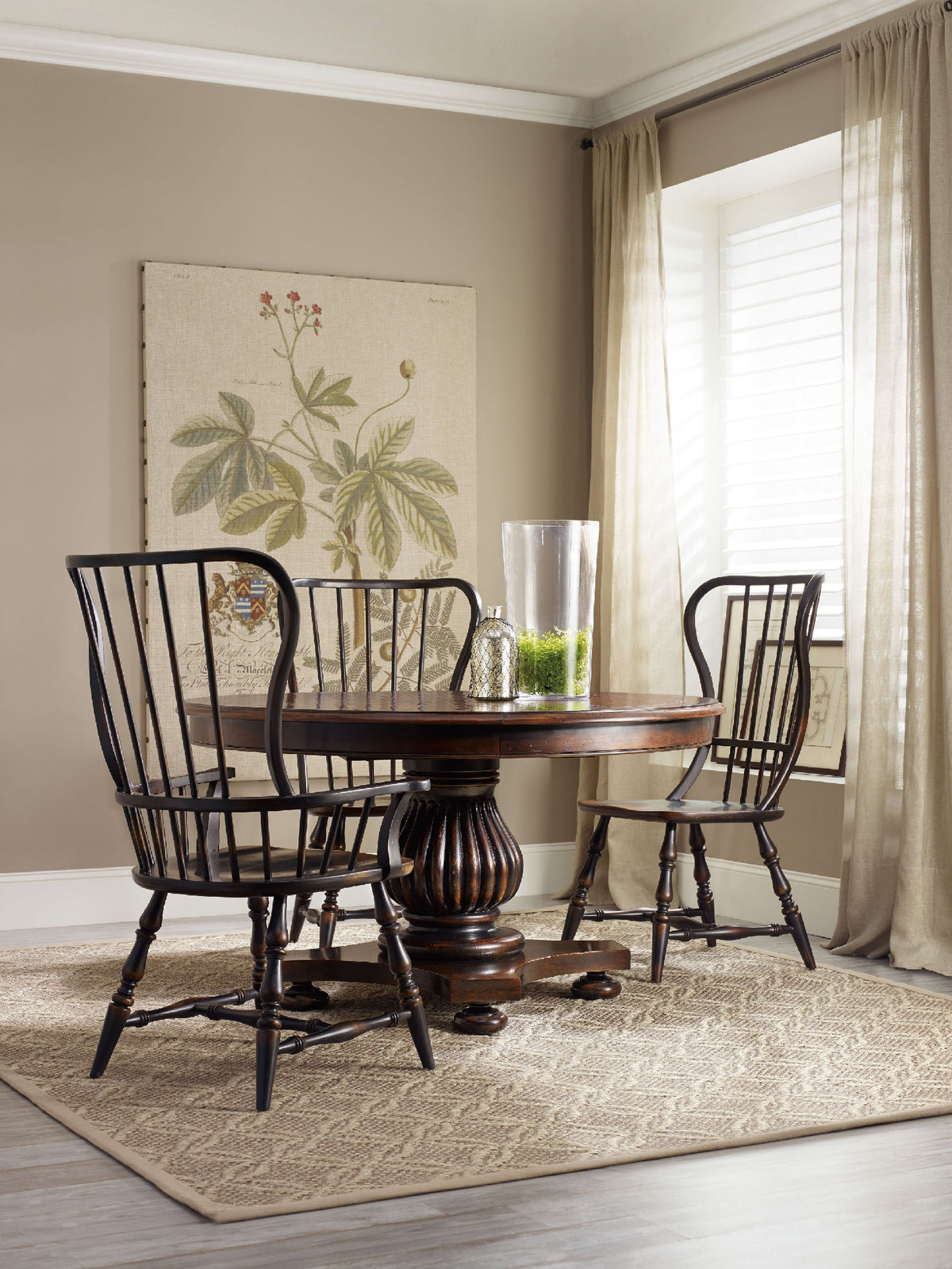 a dining table and chairs in a room