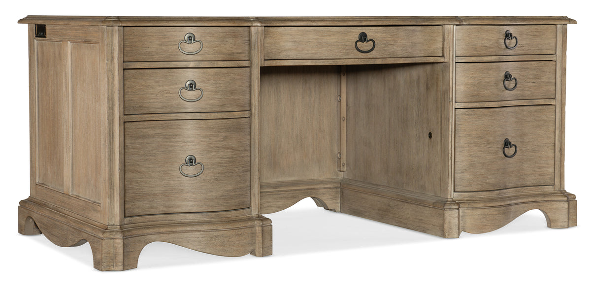 a wooden desk with drawers