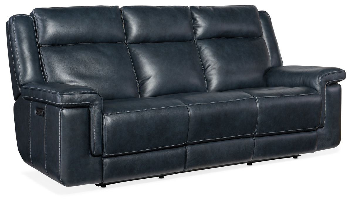 a black leather couch with white stitching
