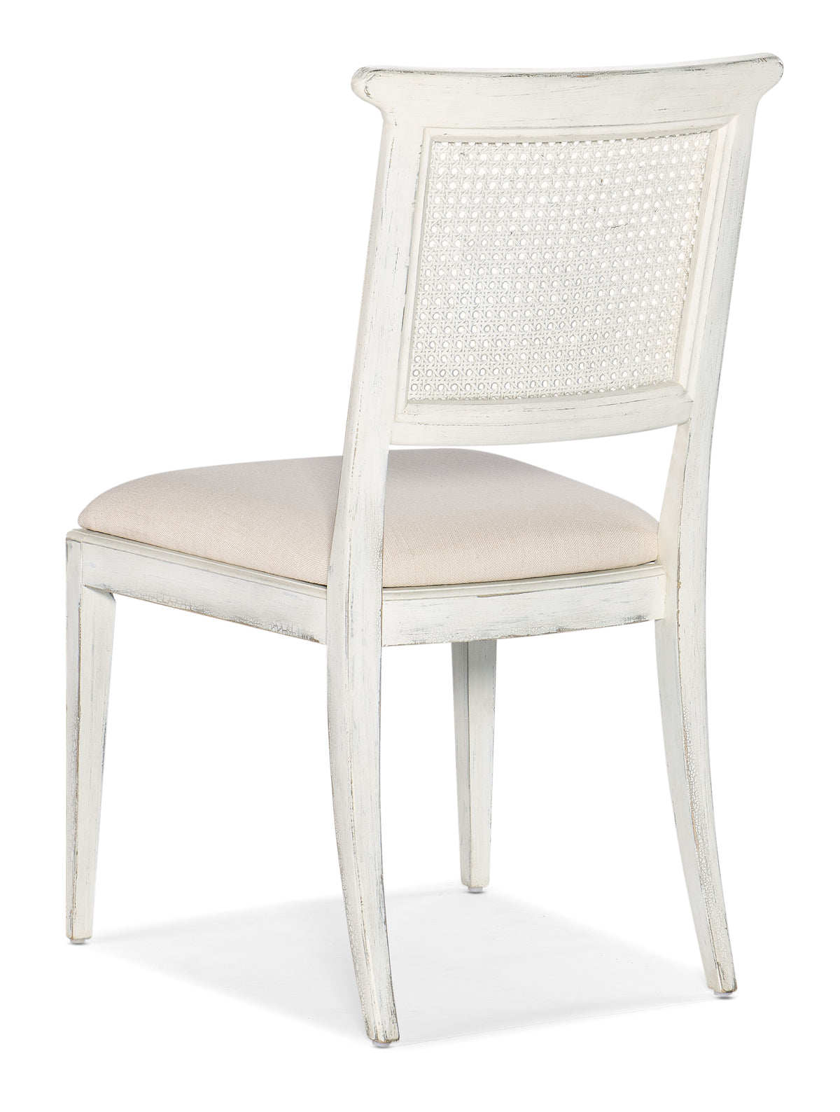 a white chair with a cushion