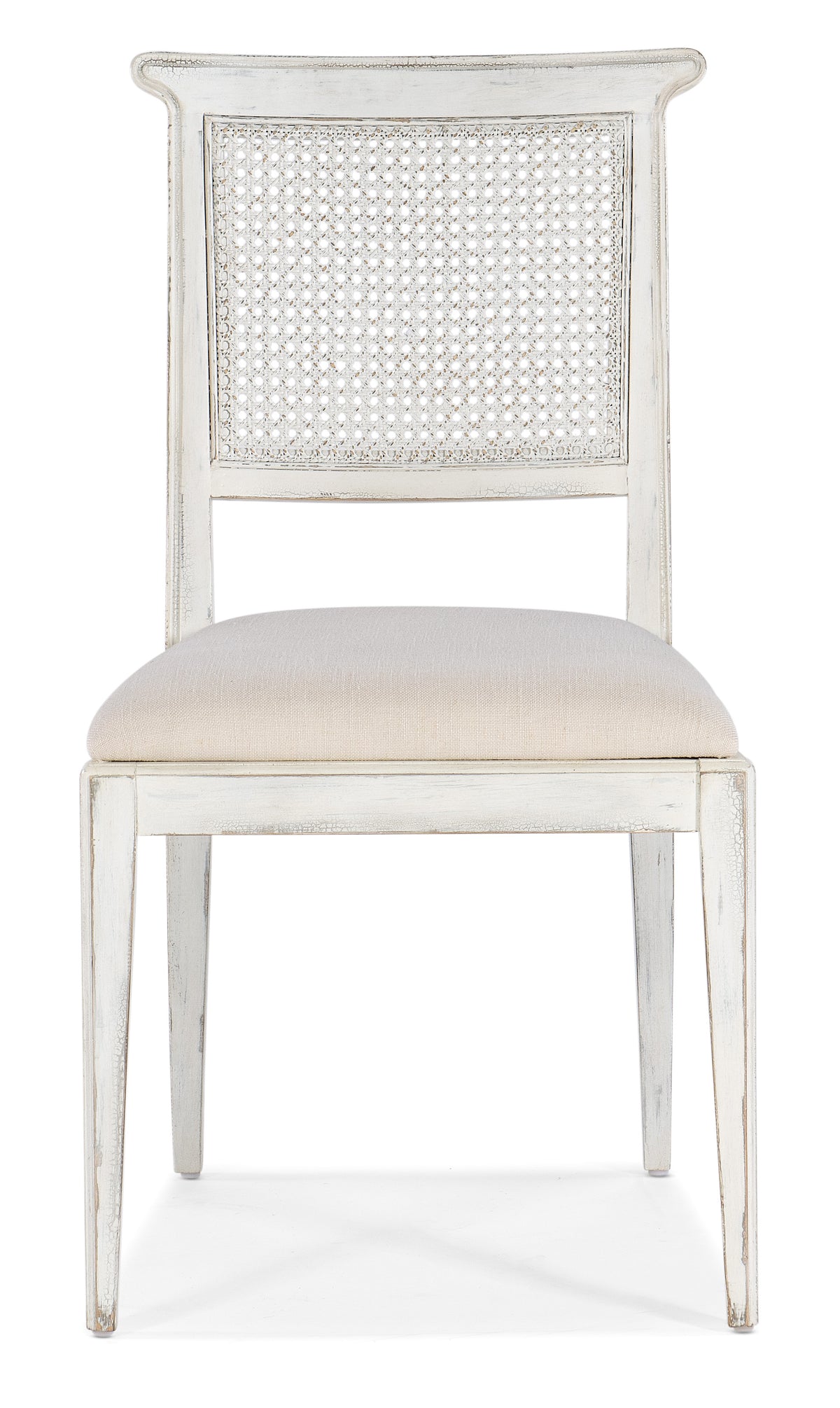 a white chair with a cushion
